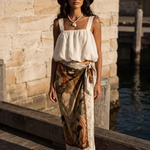 100% silk scarf inspired by Botticelli's Venus. Double-sided print, hand-rolled hem, 120cm x 120cm. Wear as a scarf, top, or wrap.